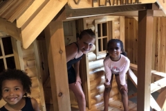 Olson-group-on-playhouse-porch