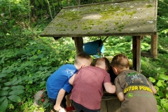 Secret-Garden.3-boys-peeking-into-the-Wishing-Well.close-up-7.31.19